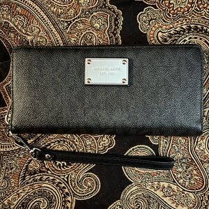 Michael Kors Black and Gold Wristlet Signature